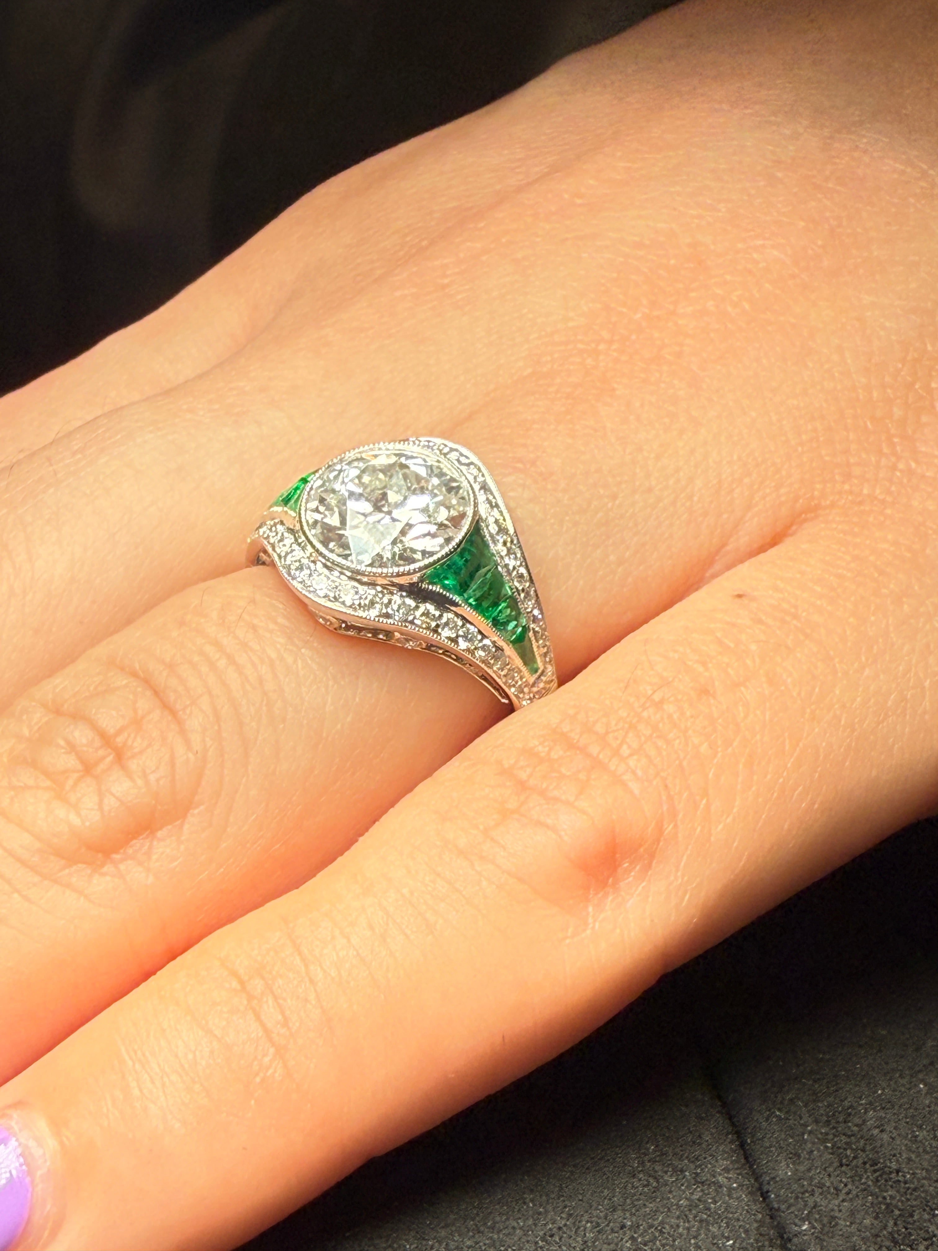 Diamond and emerald ring