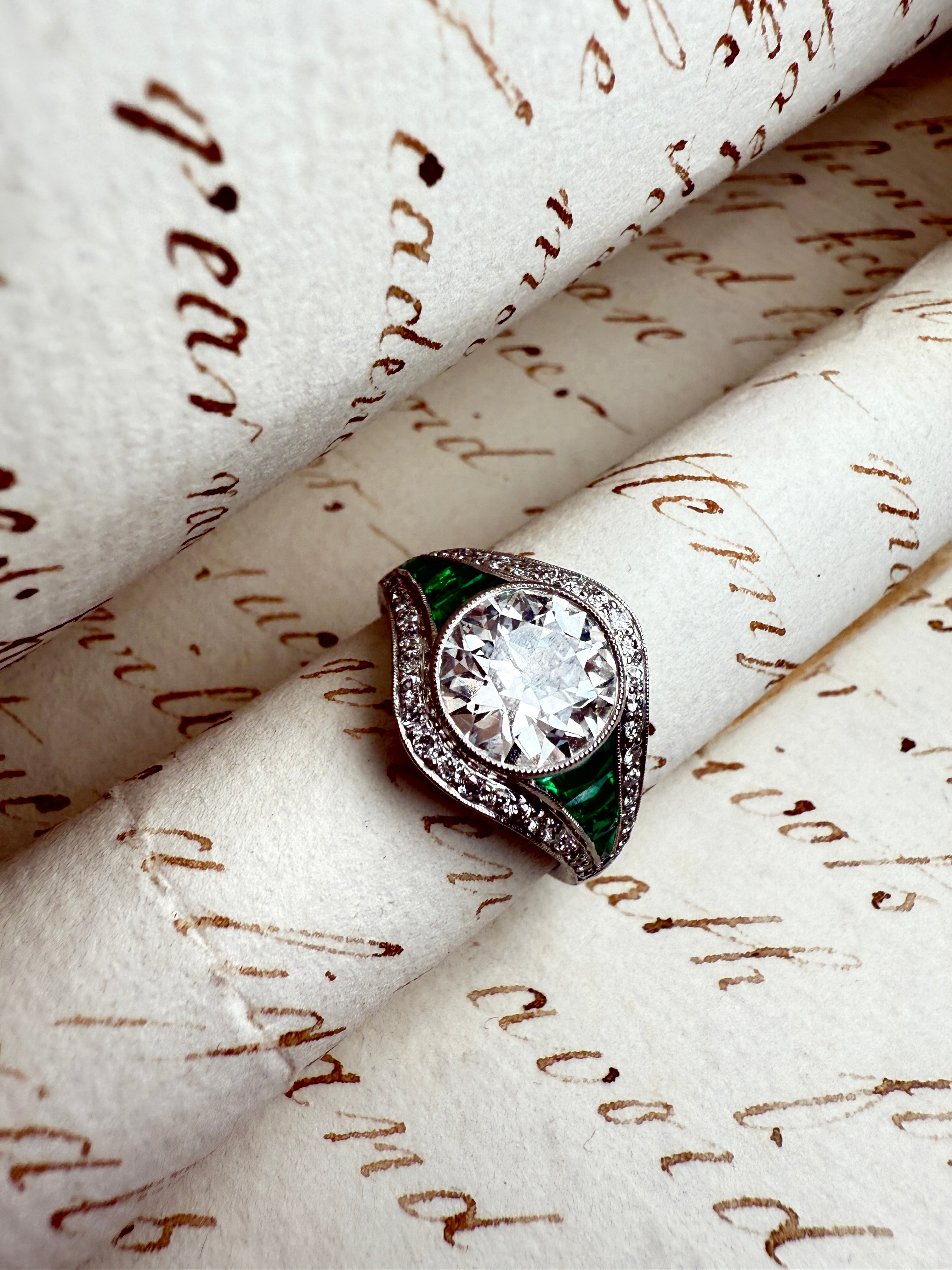 Diamond and emerald ring