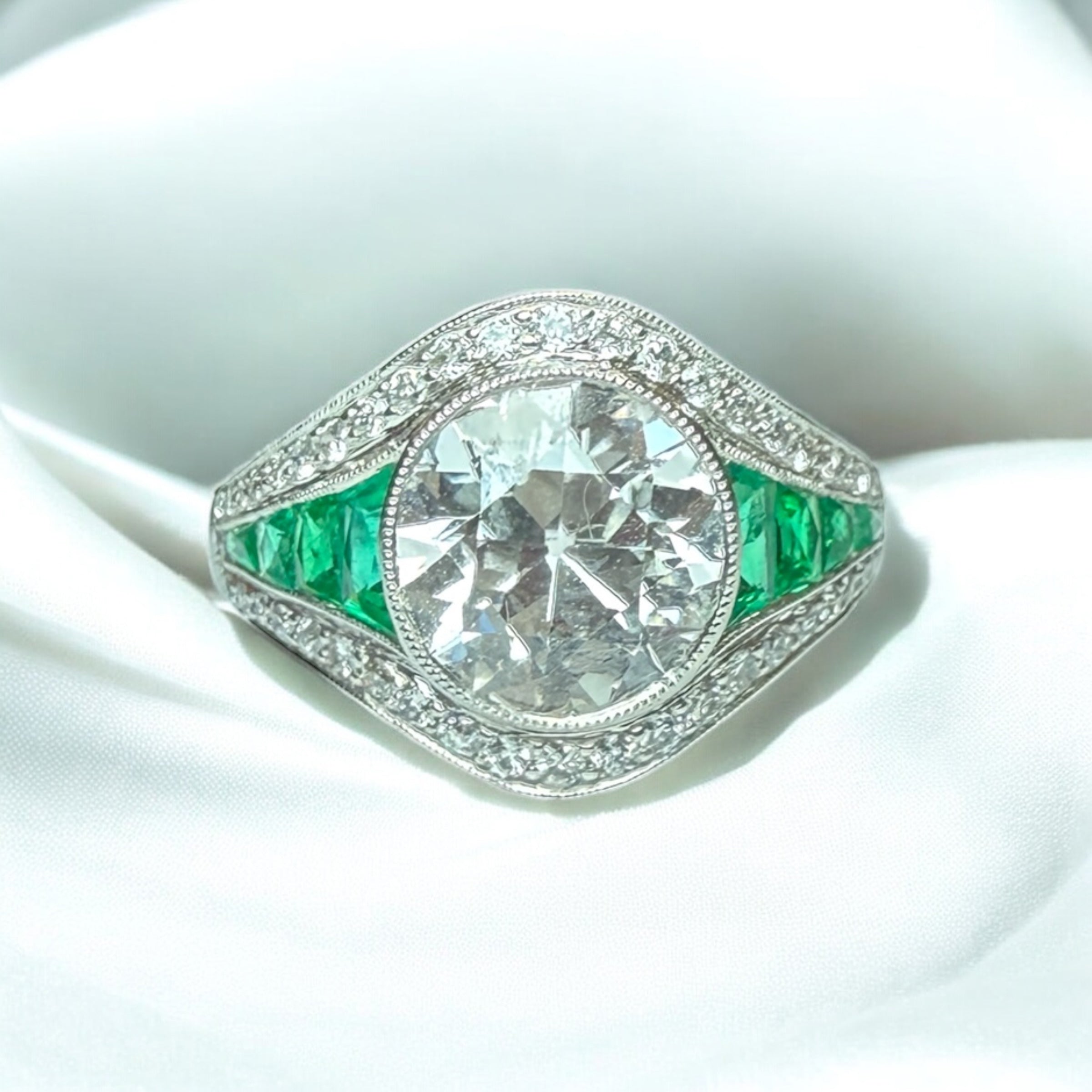 Diamond and emerald ring