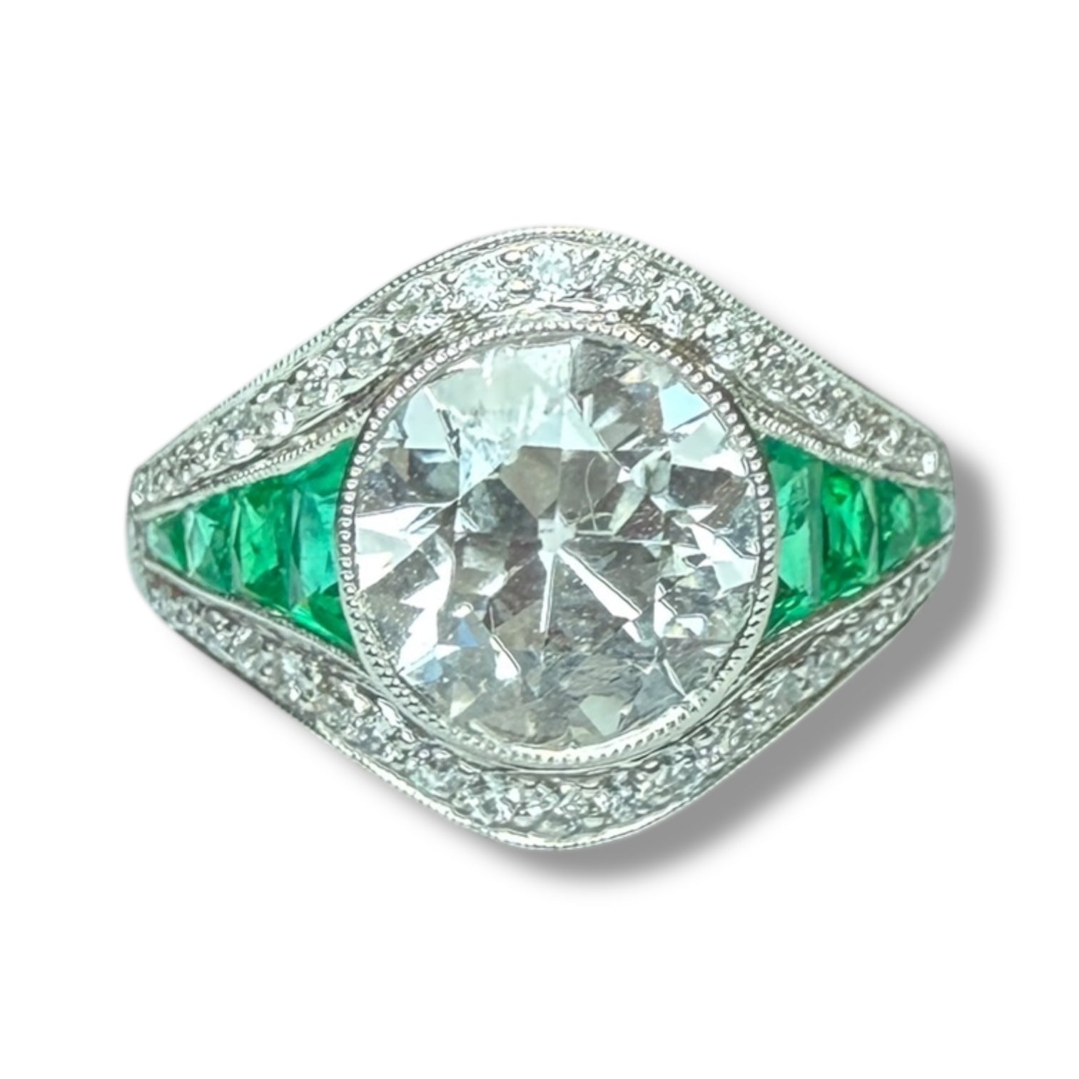 Diamond and emerald ring