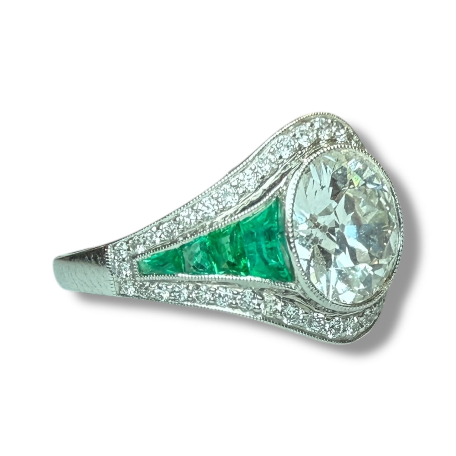 Diamond and emerald ring