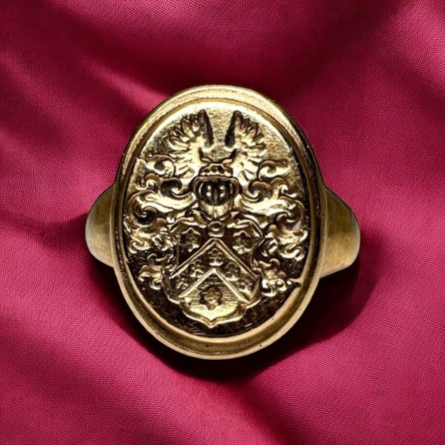 Signet gold ring.