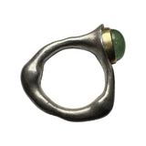 Silver and gold ring with green stone