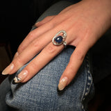 A sapphire and diamond ring