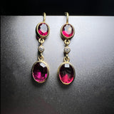 Garnet and diamonds earring in 18k gold