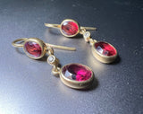 Garnet and diamonds earring in 18k gold