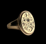 Signet gold ring.