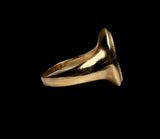 Signet gold ring.