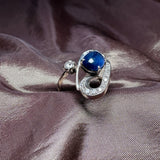 A sapphire and diamond ring