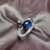 A sapphire and diamond ring