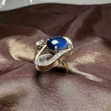 A sapphire and diamond ring